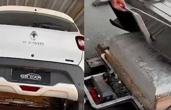 Kwid elétrico com bloco de concreto